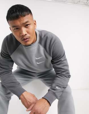 grey nike swoosh tracksuit