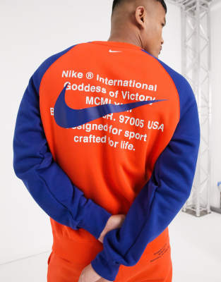 orange blue nike shirt