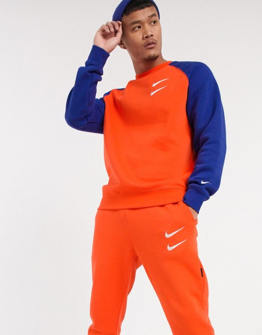 Nike Swoosh Muñequeras Cortas de Tenis - Orange/College Navy