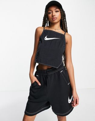 Nike Swoosh cropped ruched backstrap cami top in off black - ASOS Price Checker