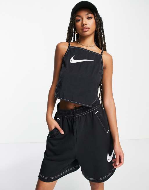 Nike Swoosh cropped ruched backstrap cami top in off black | ASOS