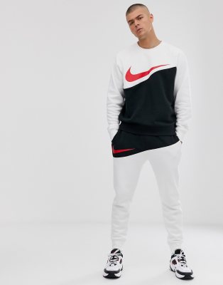 nike swoosh black tracksuit