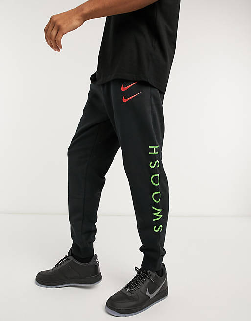 Nike Swoosh cuffed joggers in black | ASOS