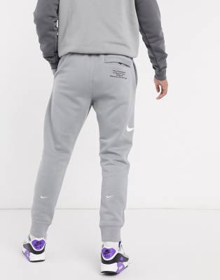 nike swoosh tracksuit grey