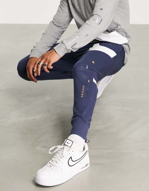 Nike Swoosh cuffed joggers in thunder blue