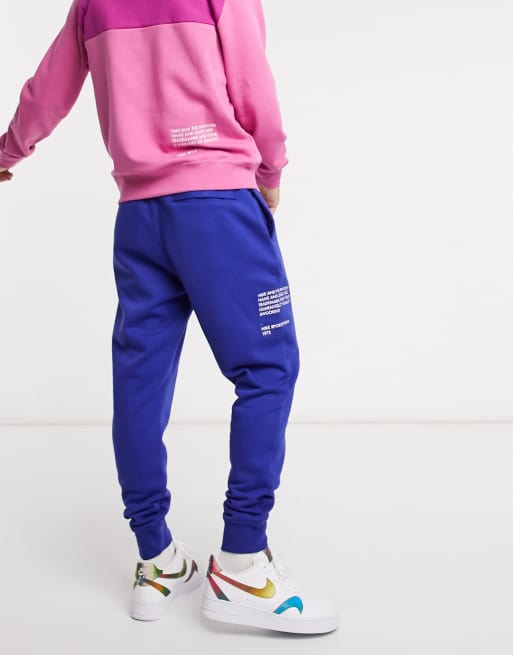 Nike Swoosh cuffed sweatpants in royal blue ASOS