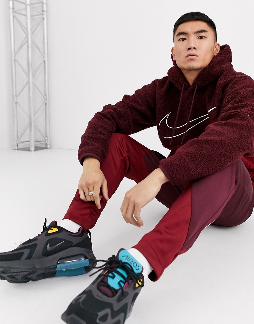 Nike Swoosh cut and sew sherpa hoodie in burgundy/red