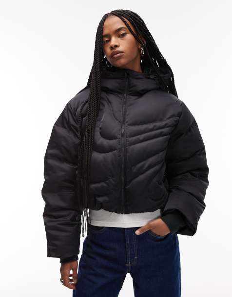 Nike Swoosh down puffer jacket in black - view 1