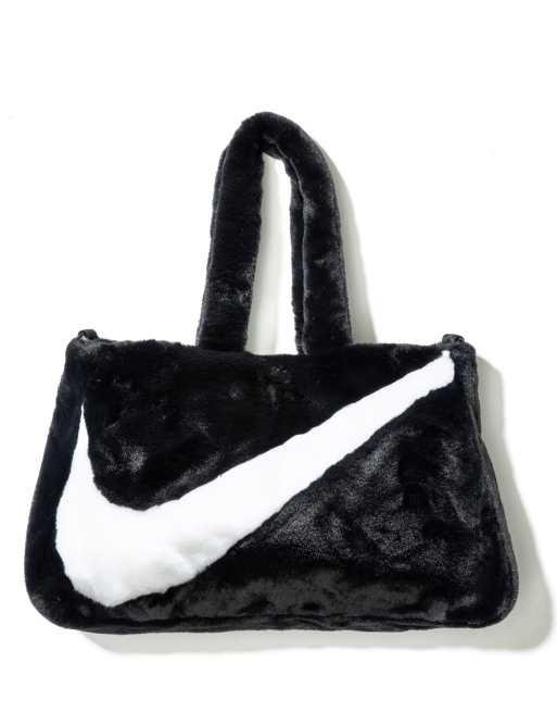 Nike Swoosh faux fur tote bag in black | ASOS