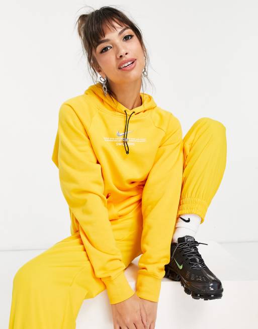 Yellow nike tracksuit store womens