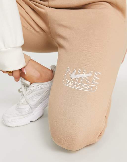 Nike swoosh fleece joggers womens hot sale