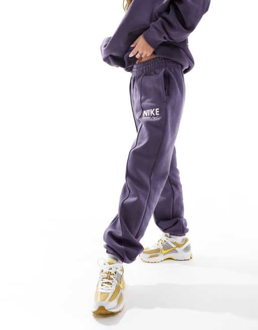 Nike Swoosh fleece joggers in dark purple