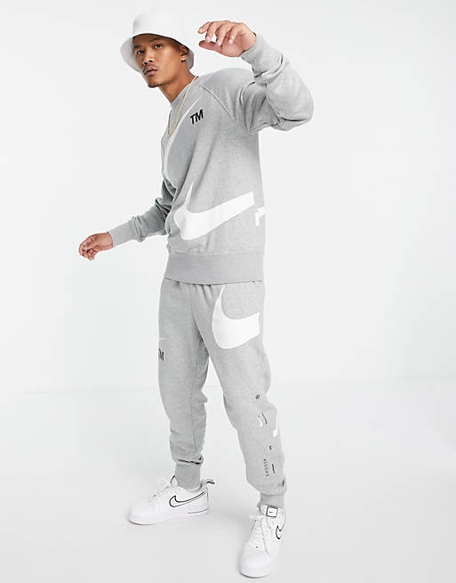 Nike Swoosh fleece joggers in grey 