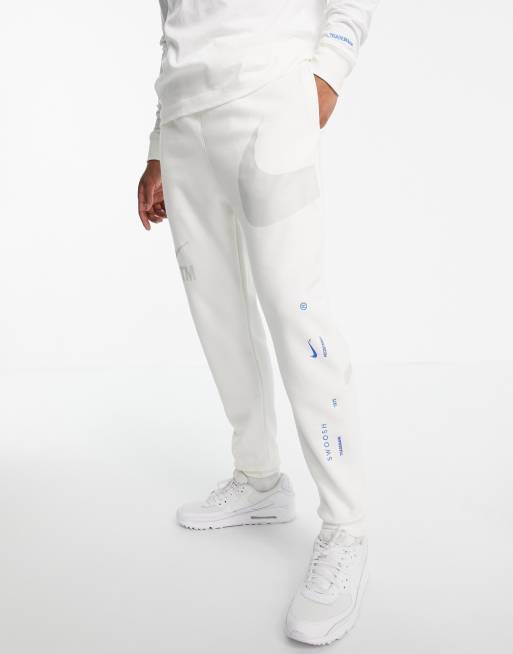 Nike swoosh cheap tracksuit white