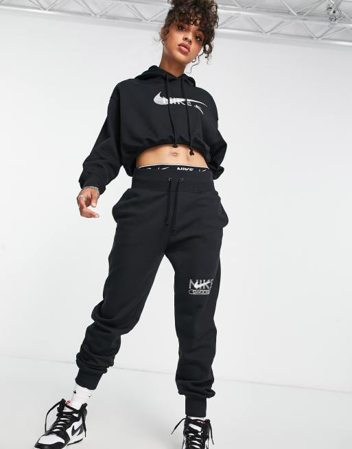 Nike Swoosh graphic joggers in black | ASOS