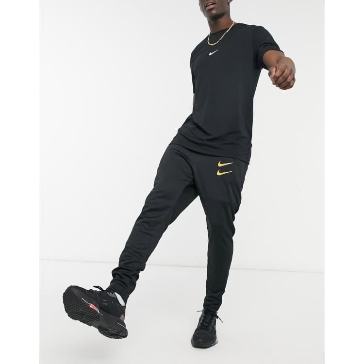 Black gold nike joggers sale