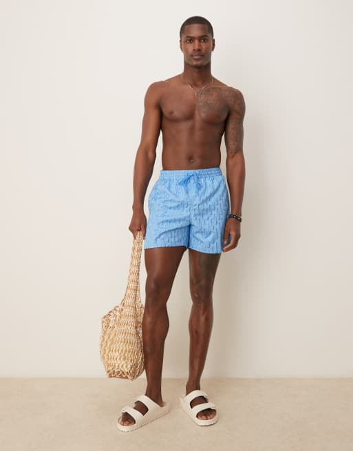 Nike Swoosh Link 5 inch Volley swim shorts in blue | ASOS