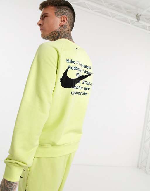 Nike Swoosh logo crew neck sweat in neon yellow