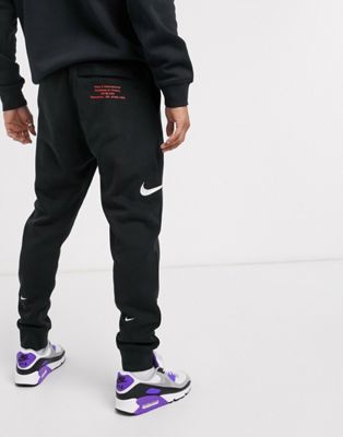 nike tick all over joggers