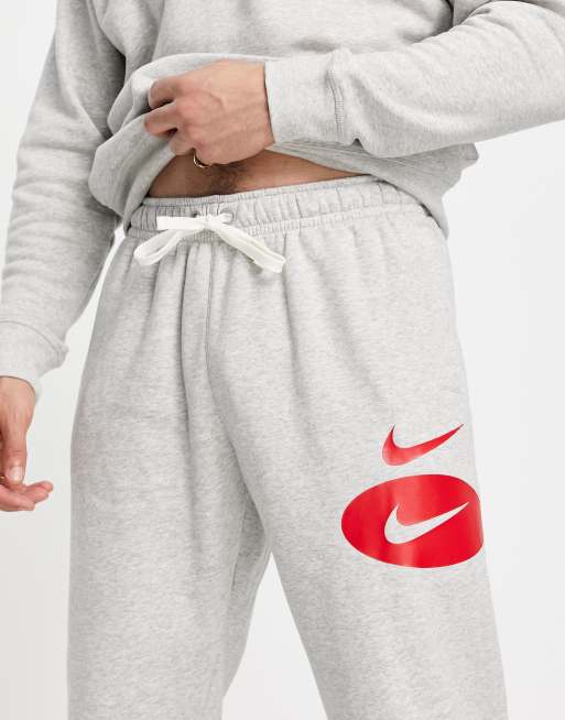 Nike swoosh best sale logo joggers