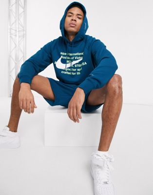 Nike Swoosh logo hoodie in teal | ASOS