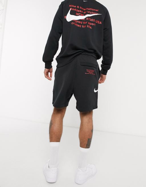 Nike Swoosh logo shorts in black ASOS