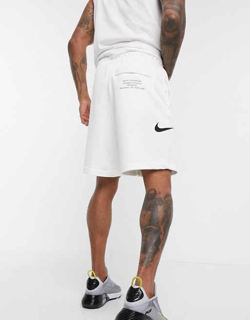 Nike Swoosh logo shorts in white