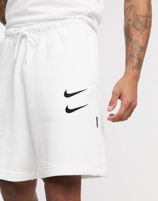Nike Swoosh logo shorts in white | ASOS