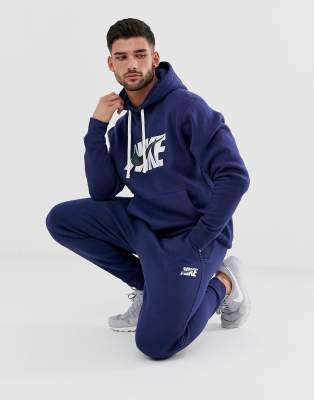 nike swoosh tracksuit blue