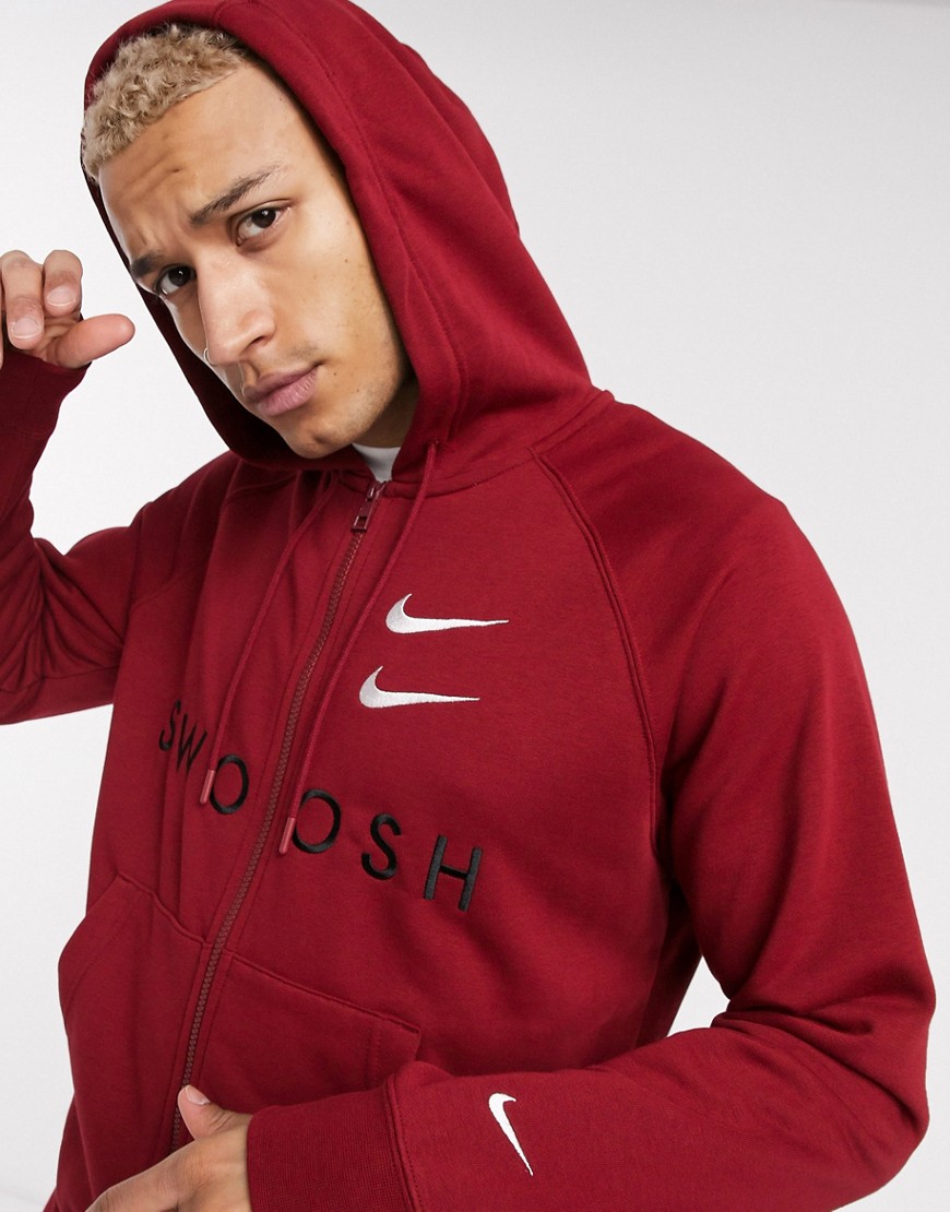 Nike Swoosh logo zip up hoodie in burgundy-Red