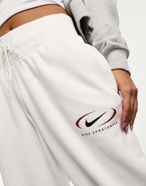 Nike sweatpants online swoosh