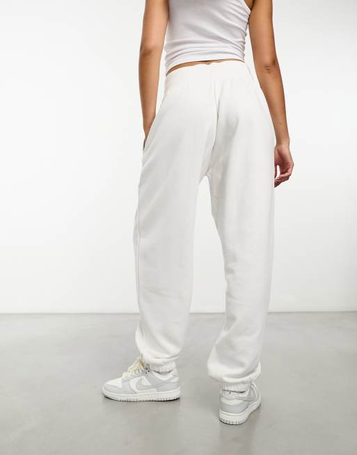 Nike mini swoosh high rise wide leg joggers in sail white