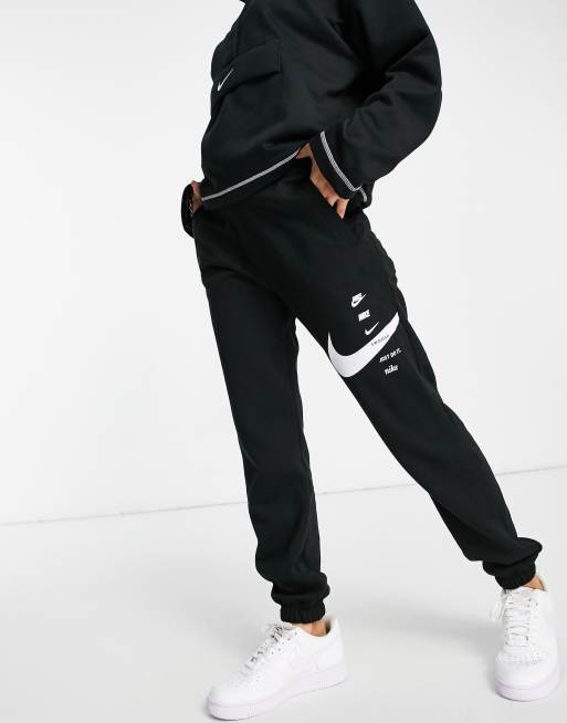 Nike swoosh oversized joggers in black