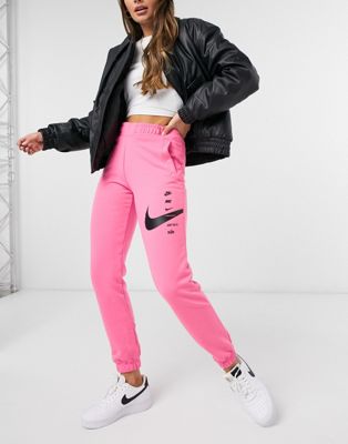 Nike swoosh oversized joggers in pink 