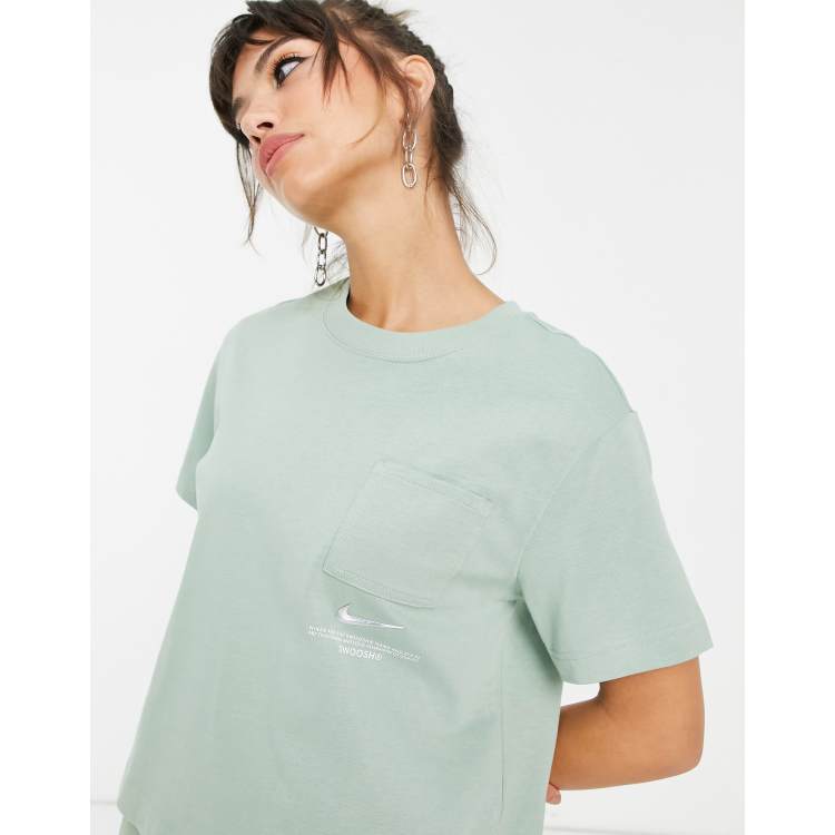 White nike shirt with best sale green swoosh