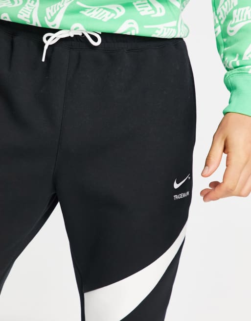 Nike Swoosh Pack cuffed sweatpants in black