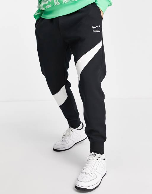 Nike Swoosh Cuffed Sweatpants in Black for Men