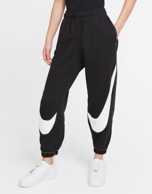 Nike Swoosh Pack Loose-fit Cuffed Fleece Sweatpants In Black In Black