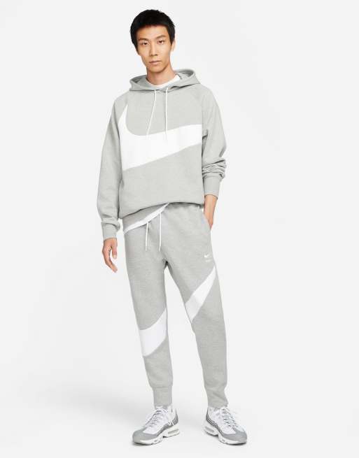 Nike Swoosh Pack cuffed sweatpants in gray heather | ASOS