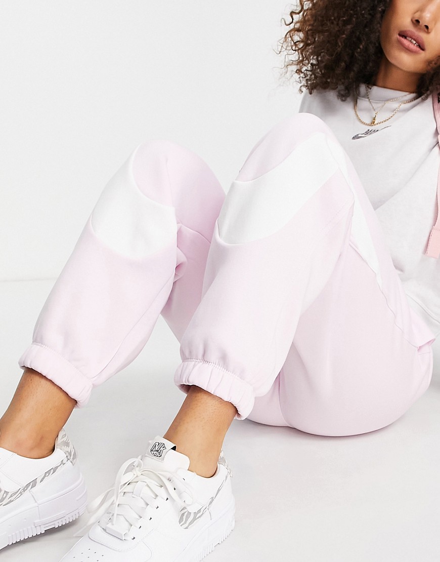 Nike Swoosh Pack cuffed sweatpants in pale pink