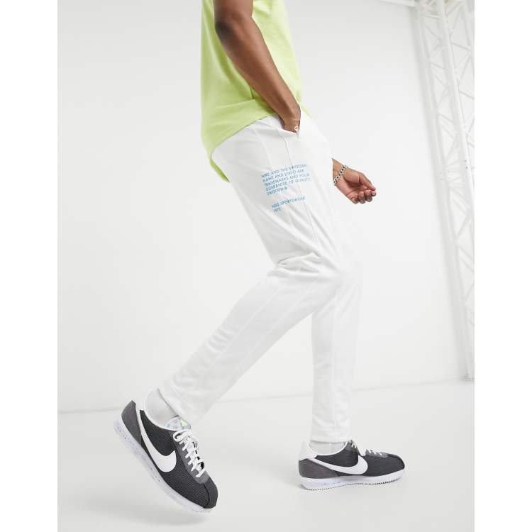 Nike Swoosh Pack polyknit cuffed joggers in white ASOS