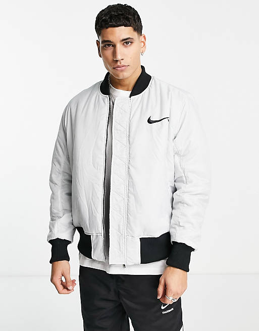 Nike Swoosh Pack synthetic-fill reversible bomber jacket in black