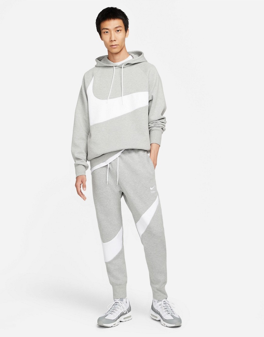 Nike Swoosh Pack Tech Fleece cuffed sweatpants in gray heather-Grey