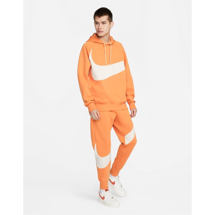 Nike orange hot sale swoosh