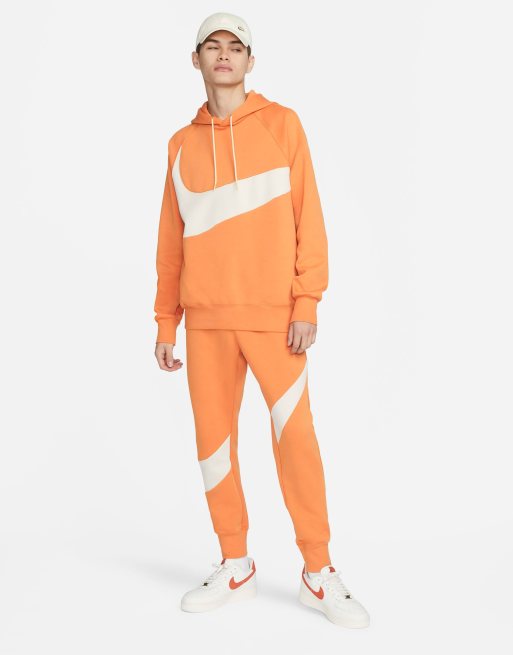 orange nike tech fit