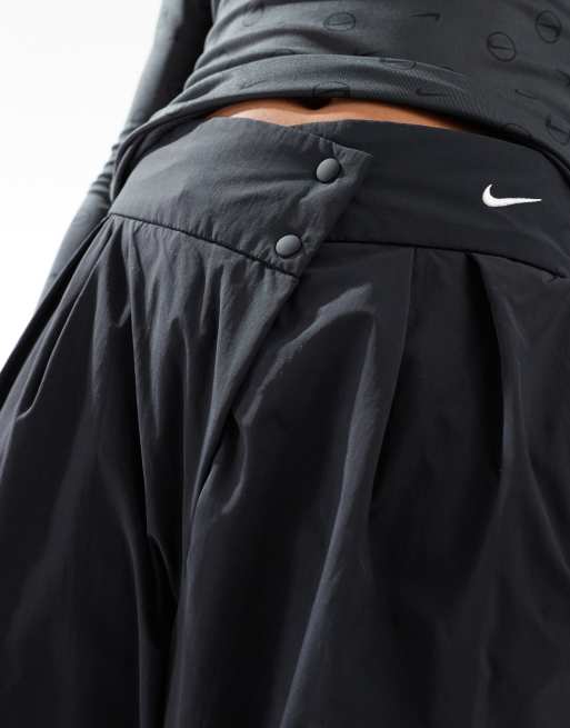 Nike Swoosh Pantaloni asimmetrici neri con logo