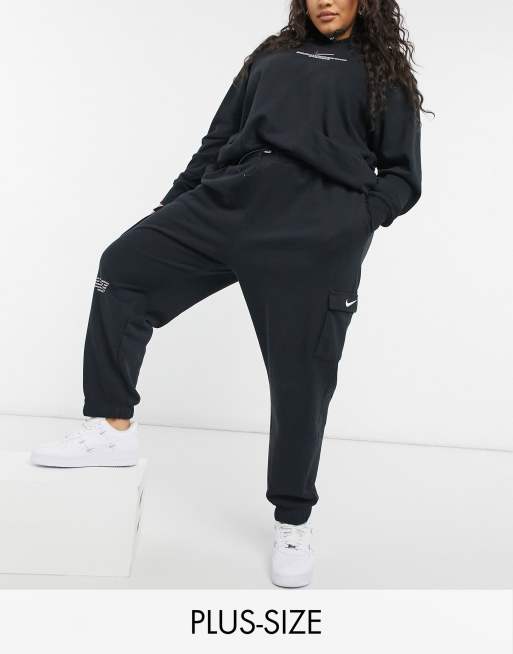 Nike Swoosh Plus tracksuit in black ASOS