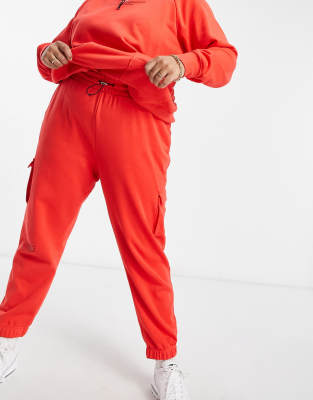 red nike trackies