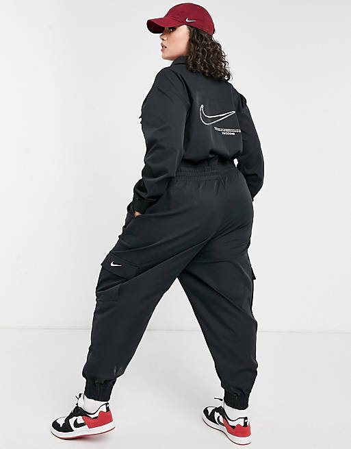 Nike Swoosh Plus utility jumpsuit in black