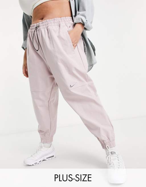 Nike woven sales pants pink